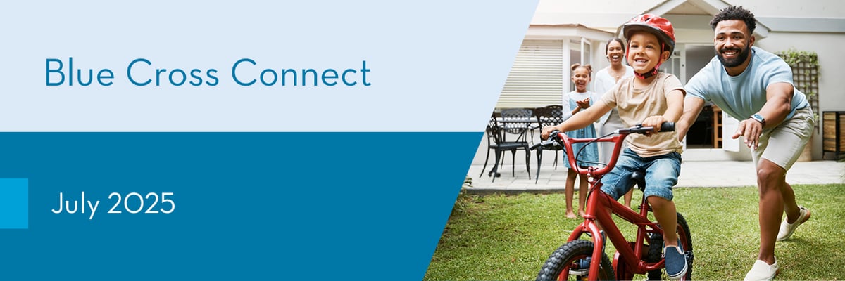 Man pushing his child who is on a bicycle. Text reads: Blue Cross Connect July 2025