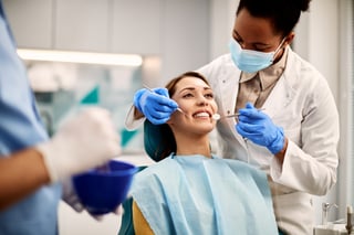 Woman getting teeth cleaned