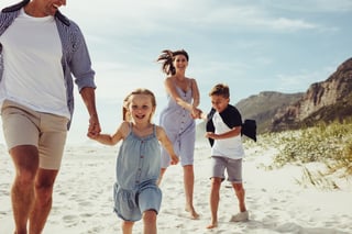 An image of a family at the beach
